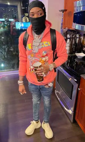 Lil Migo wearing Gucci sock