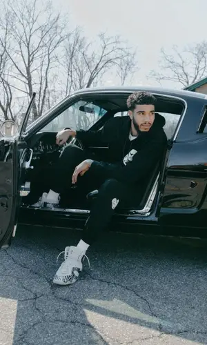 Jayson Tatum wearing Mcflyy hoody