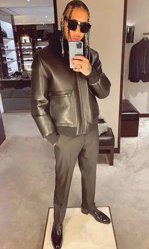 Tyga wearing Louis Vuitton boots