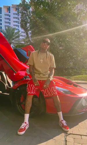 Tyga wearing Rhude shorts