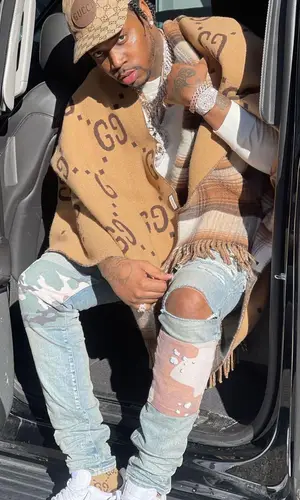 Fivio Foreign wearing Gucci cap