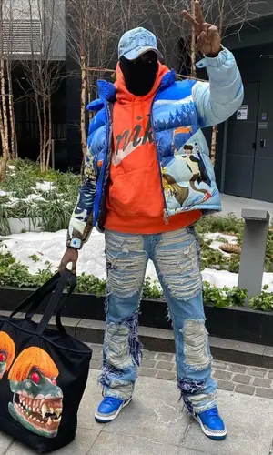 Sheck Wes wearing Who Decides War jeans