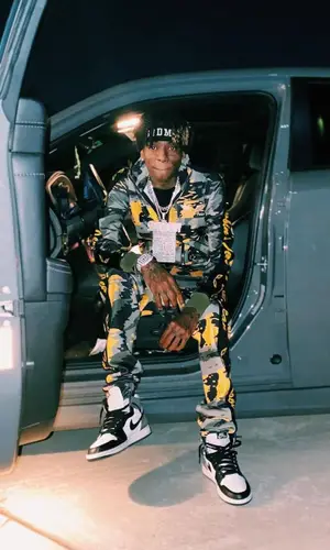 Soulja Boy wearing Robins Jeans pants