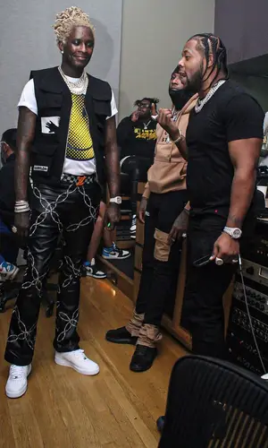 Young Thug wearing Louis Vuitton belt