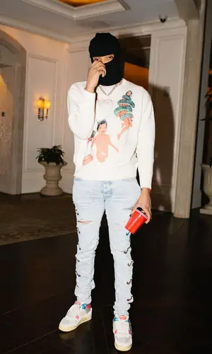 G Herbo wearing Sicko sweater