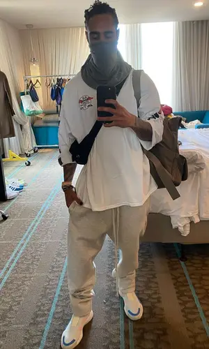 Jerry Lorenzo wearing Prada bag