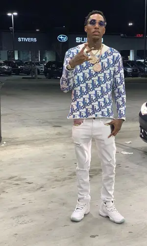 Rubberband OG wearing Cartier eyewear