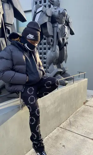 Offset wearing Supreme hat