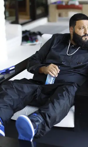 DJ Khaled wearing Prada trousers