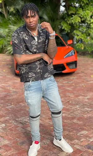 Fredo Bang wearing Louis Vuitton belt