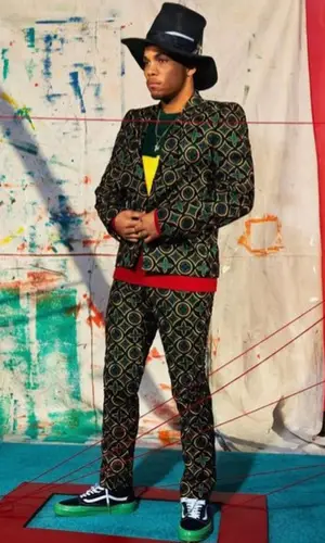 Anderson Paak wearing Louis Vuitton jacket