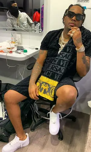 Fivio Foreign wearing Louis Vuitton eyewear