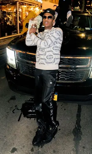 Smooky MarGielaa wearing Philipp Plein pants