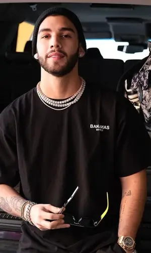 Manuel Turizo wearing Prada eyewear
