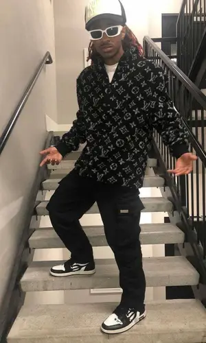Lil HBK wearing Versace eyewear