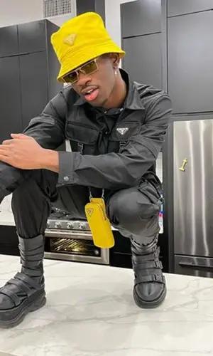 Lil Nas X wearing Prada bag