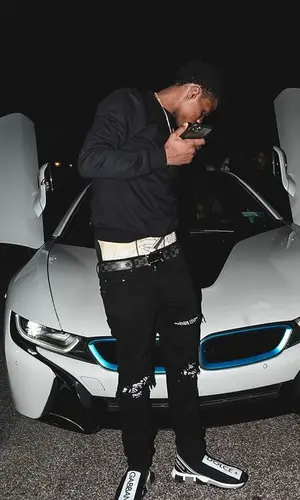 TJ Porter wearing Amiri jeans