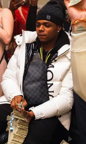 TJ Porter wearing Amiri jeans