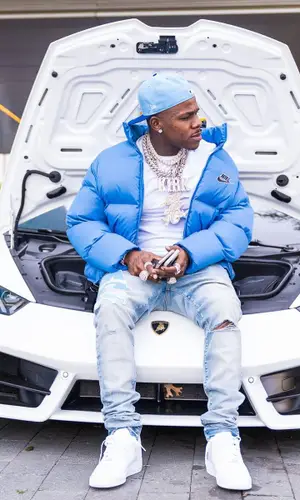 DaBaby wearing Supreme jacket