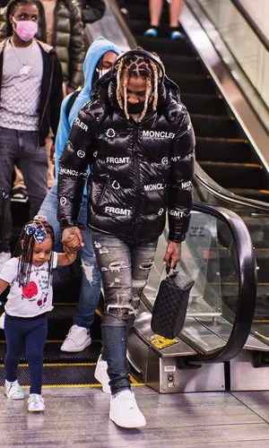 Lil Durk wearing Louis Vuitton bag