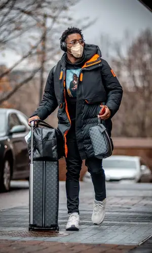 Donovan Mitchell wearing Adidas sneakers