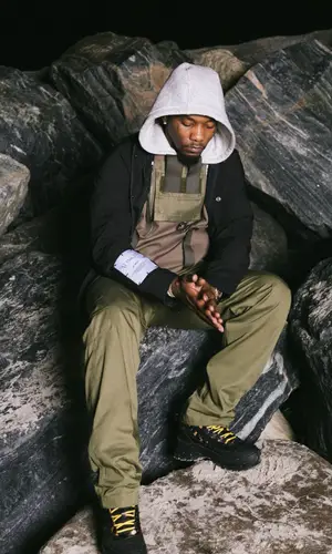 Offset wearing MCQ shirt