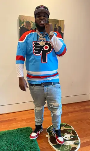 Maxo Kream wearing Louis Vuitton belt
