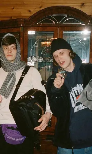 OG Buda wearing Places + Faces bag