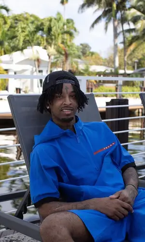21 Savage wearing Chrome Hearts cap