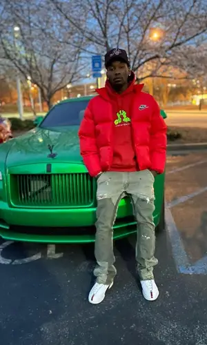 Offset wearing New Era cap