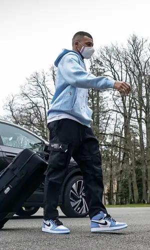 Kylian Mbappe wearing Jordan pants
