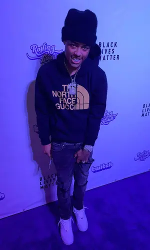 Luh Kel wearing Gucci hoody