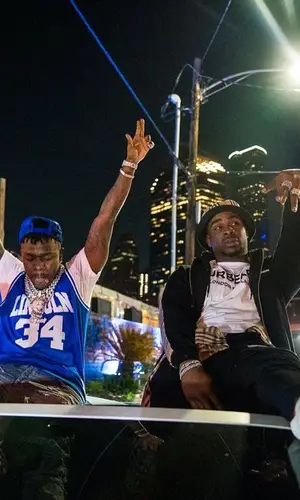 DaBaby wearing Amiri jeans