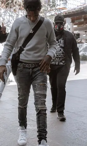 A Boogie Wit Da Hoodie wearing Dior belt