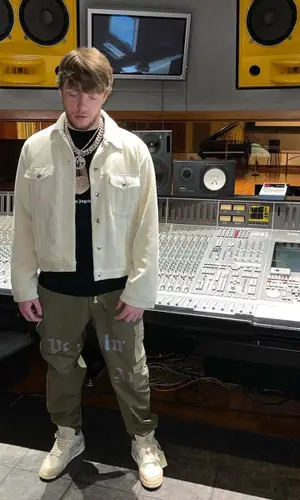 Murda Beatz wearing Palm Angels t-shirt