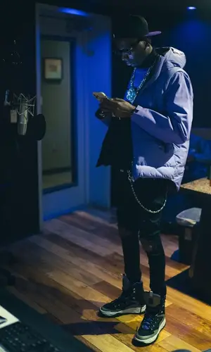Young Dolph wearing New Era cap