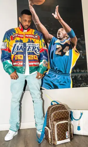 Fabolous wearing Louis Vuitton backpack