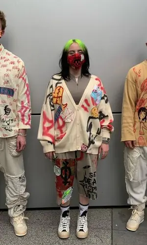 Billie Eilish wearing Converse sneakers