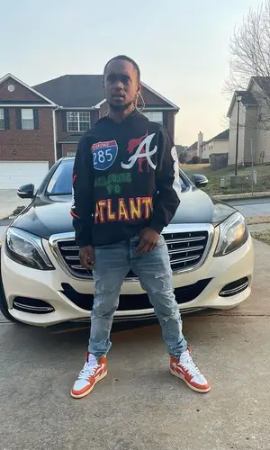 Slim Jxmmi wearing Amiri jeans