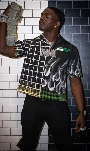 Bankroll Freddie wearing Prada shirt