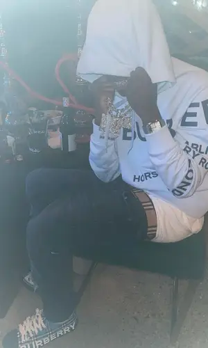 Quando Rondo wearing Burberry hoody