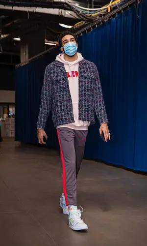 Jayson Tatum wearing Christos shirt