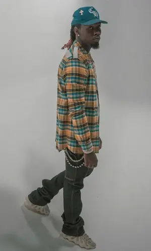 Offset wearing Chrome Hearts cap