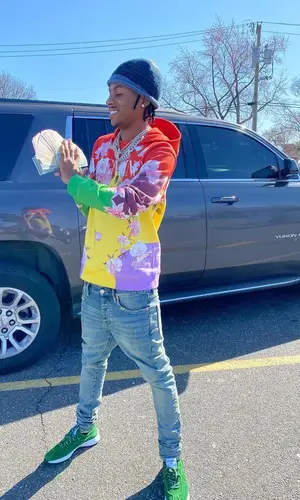 Rich The Kid wearing Valentino sweatshirt