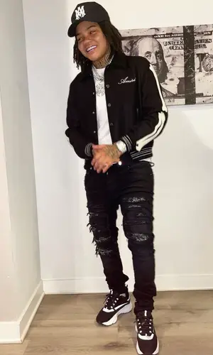 Young M.A wearing Amiri jeans