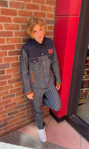 The Kid Laroi wearing Gucci jacket