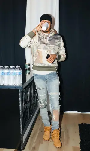 G Herbo wearing Amiri hoody