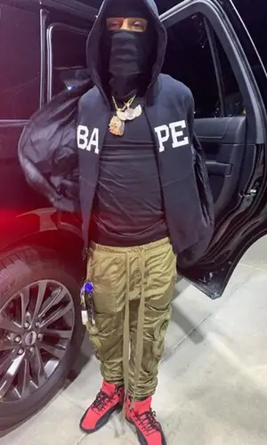 Shordie Shordie wearing Fear of God pants