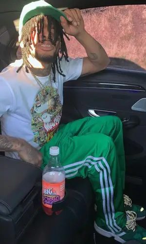 Shordie Shordie wearing New Era cap