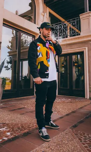 Russ wearing Amiri jeans